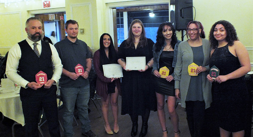 Recruits were also honored at the dinner; L-R two existing firefighters Brandon Moore and Zach Adolphsen, who achieved interior firefighting certification; members Michaela Raffa and Rachael Robinson who became certified EMTs; new regular members Iyleea and Alyssa Lunsford; and new Junior member Jaedyn Lunsford.